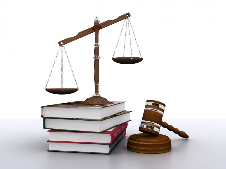 Fotolia_56948361_Scales-of-justice-on-books-beside-gavel_M-e1460736543681