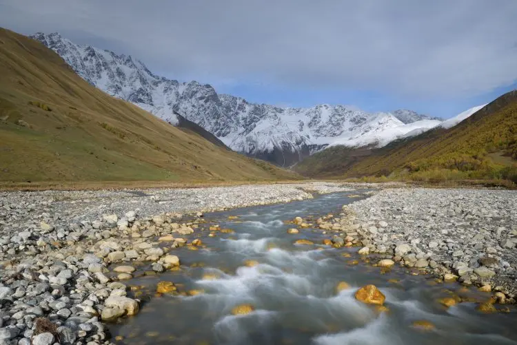 Fotolia_96307083_Landscape-with-a-Mountain-River_M-e1465482112740