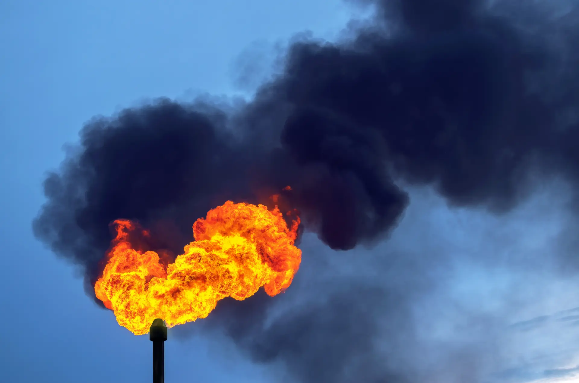 shutterstock_215236882 - Black smoke from burning of gas