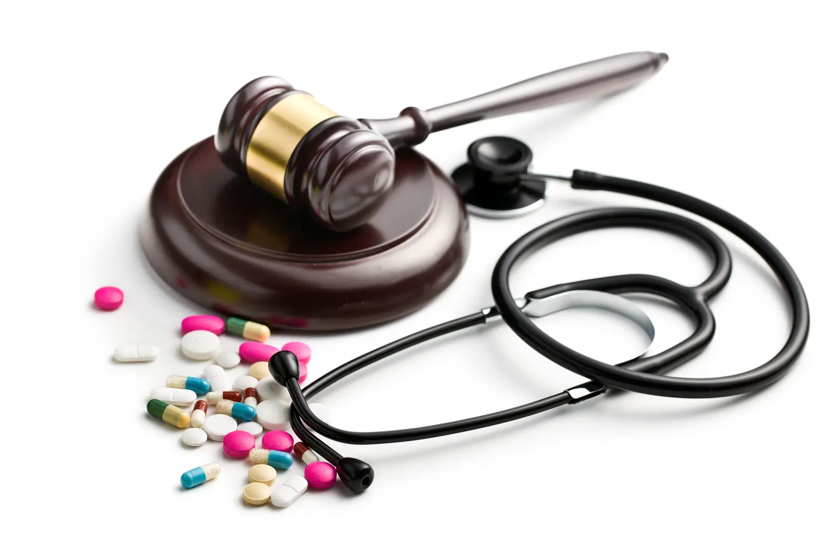 Fotolia_59007011_judge's gavel with stethoscope and pills_M