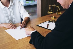 two people at a desk working