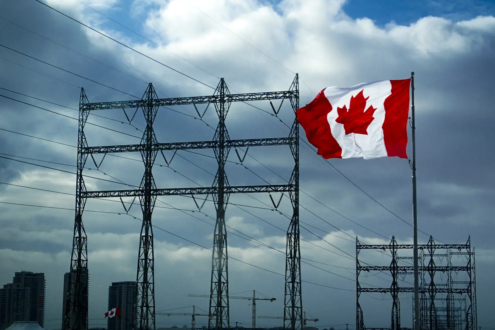 Fotolia_124462819_Canadian Flag with power lines _M
