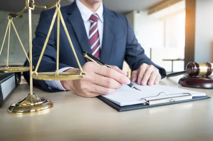 shutterstock_678458245_lawyer at a desk_web