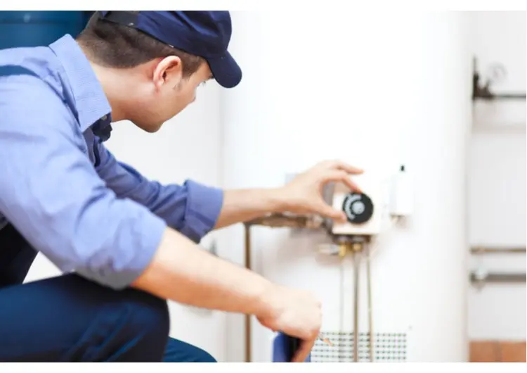 Man working on water heater