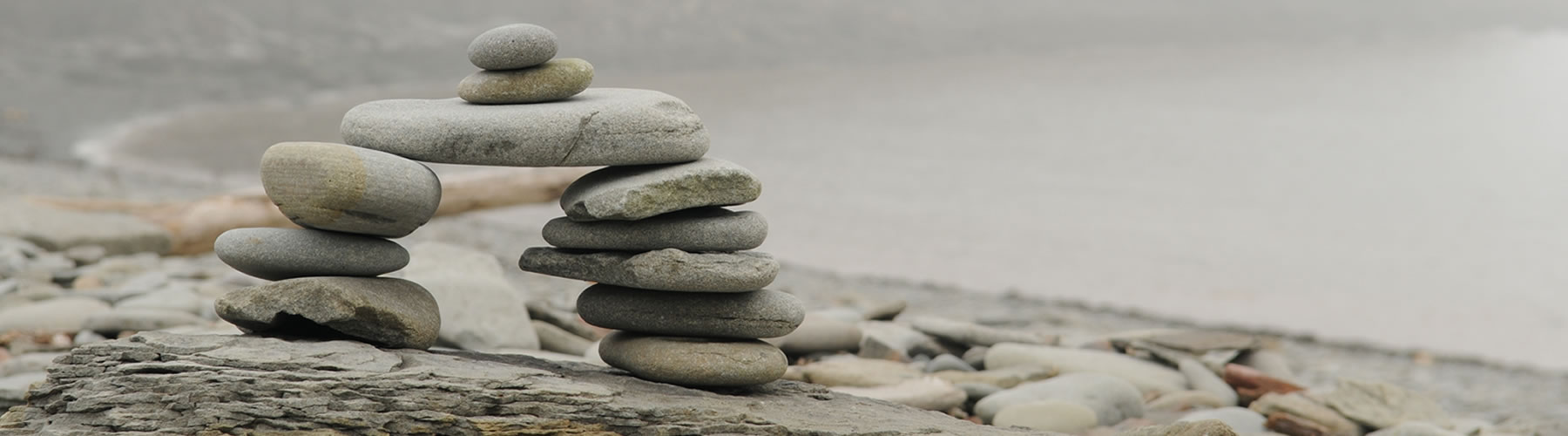 Small inukshuk with foggy background