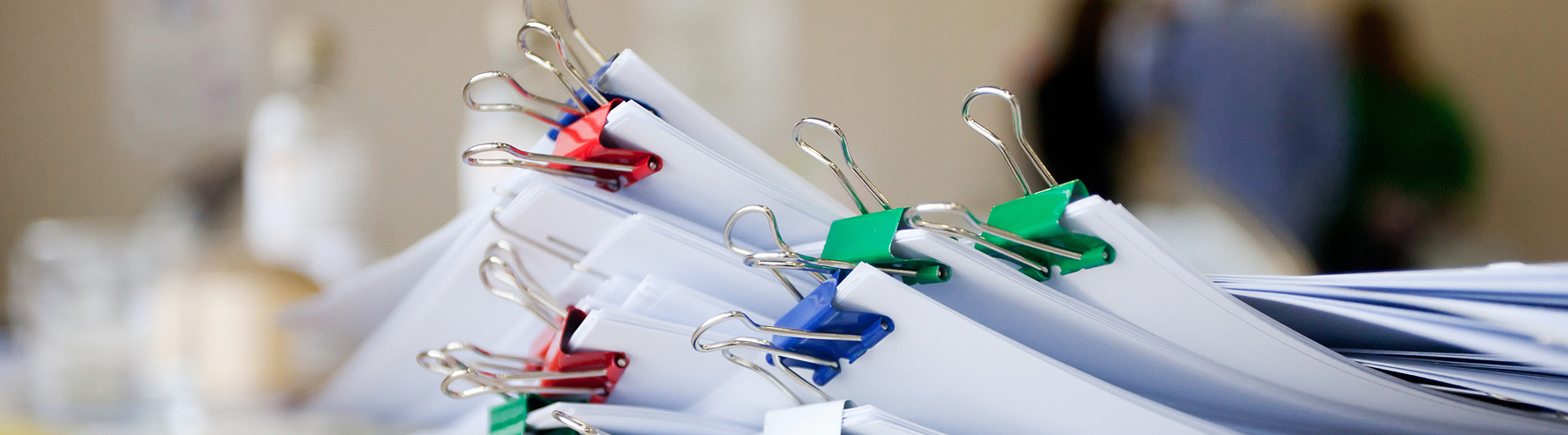 Documents with colorful paper clips